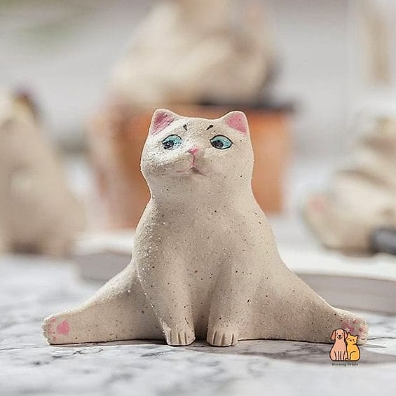 The Ceramic Cat Figurine Shelf Bed