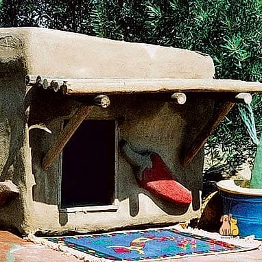 20 Stunning Dog Houses For Multiple Dogs Guaranteed to Make You Smile 15 The Southwestern Adobe-Style House