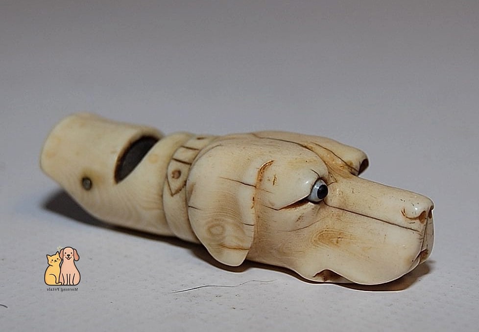 19 Adorable Best Dog Whistles Guaranteed to Make You Smile 4 The Wooden Bone-Shaped Whistle